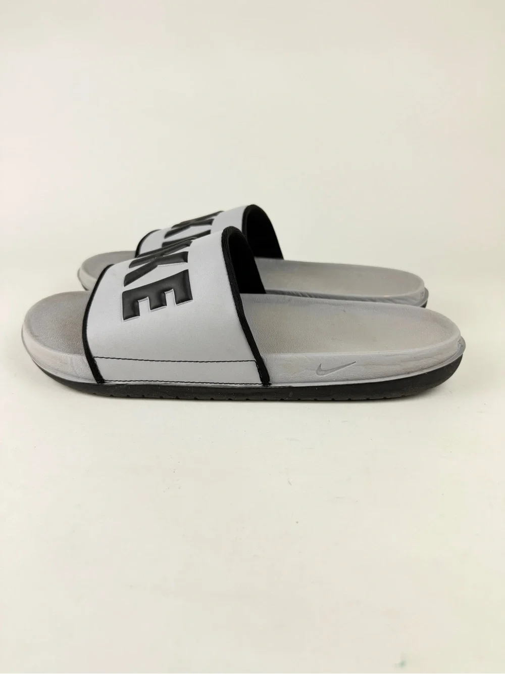Nike Offcourt Slides in Gray with Black Logo